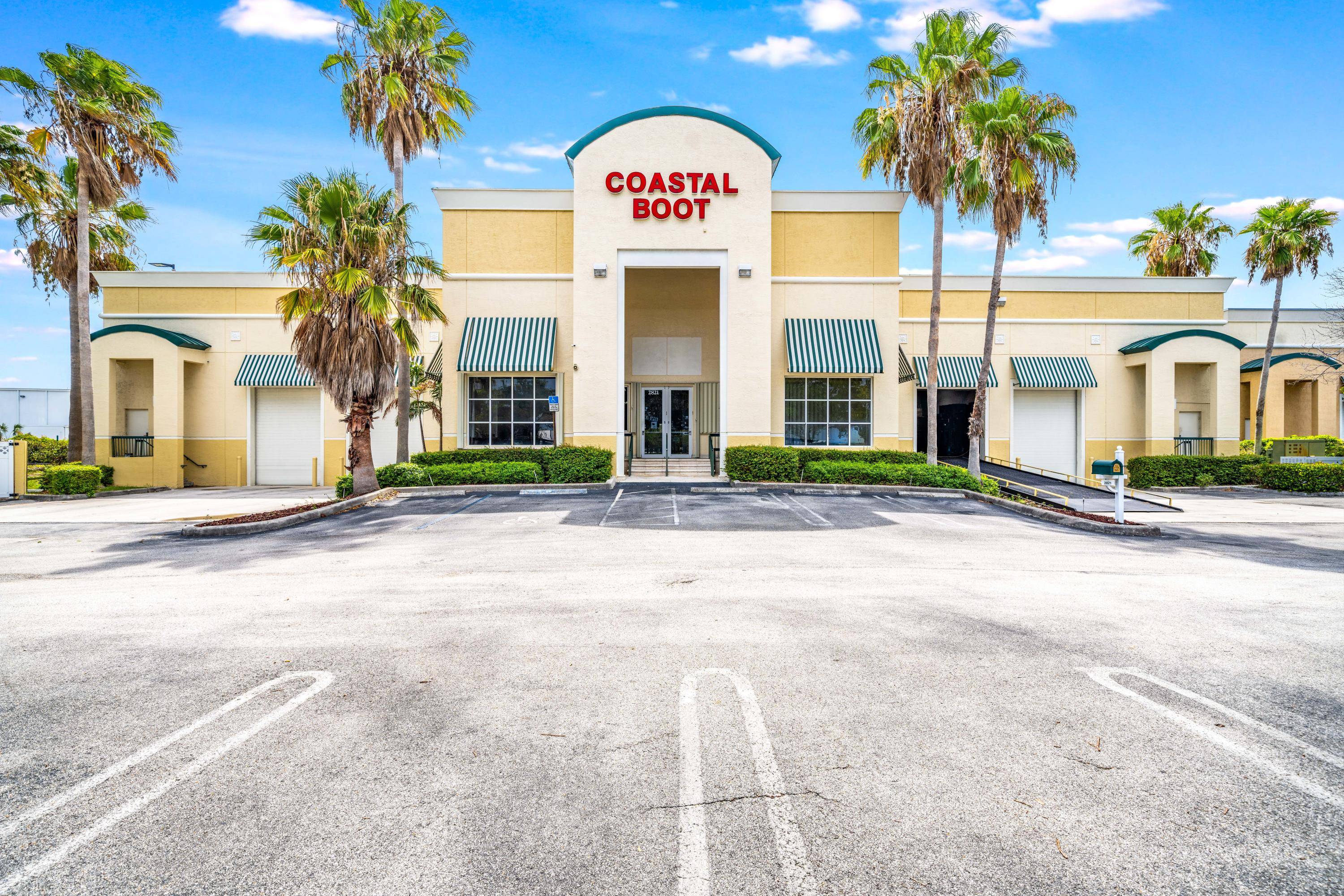 WHAT YOU HAVE BEEN WAITING FOR A FREE STANDING 17, 000 SF INDUSTRIAL WAREHOUSE IN CENTER PORT.
