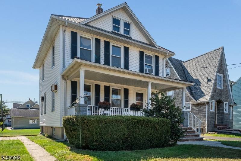 Welcome to this charming 1920's Colonial, rich with character and timeless details.