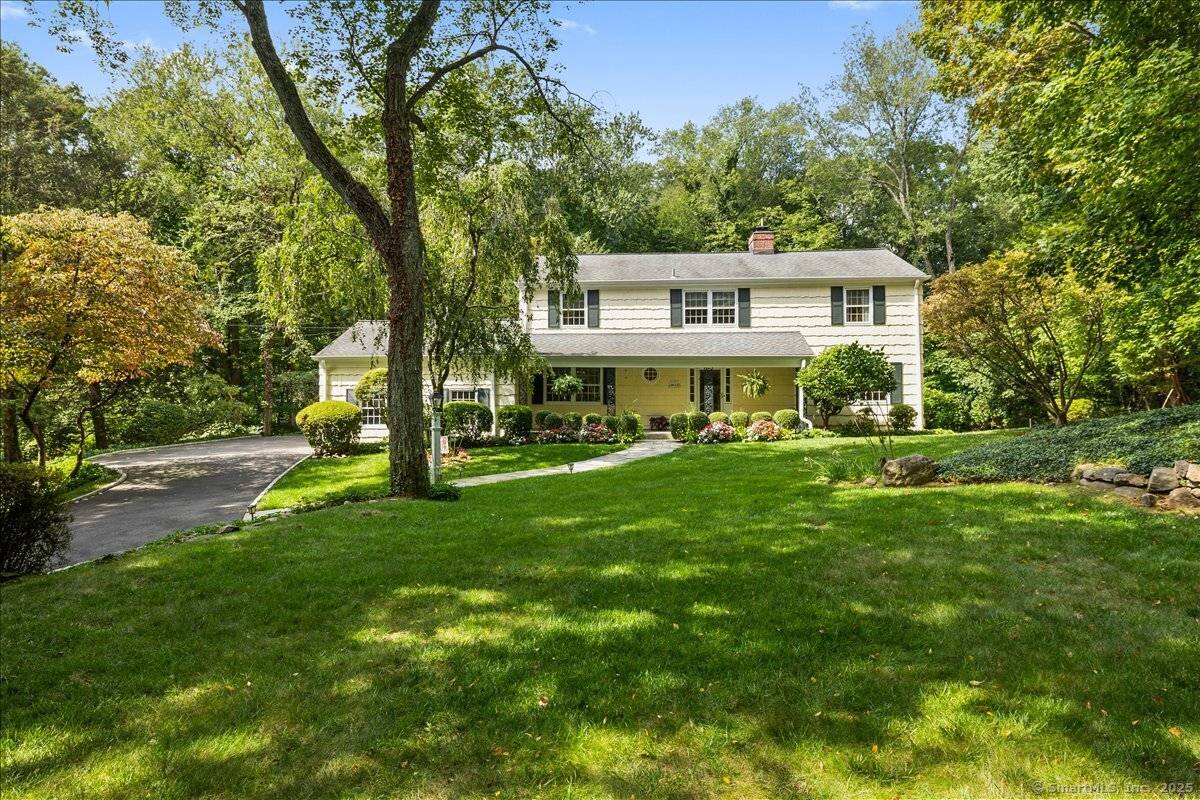 Situated on a quiet cul de sac, this classic center hall Colonial has it all !