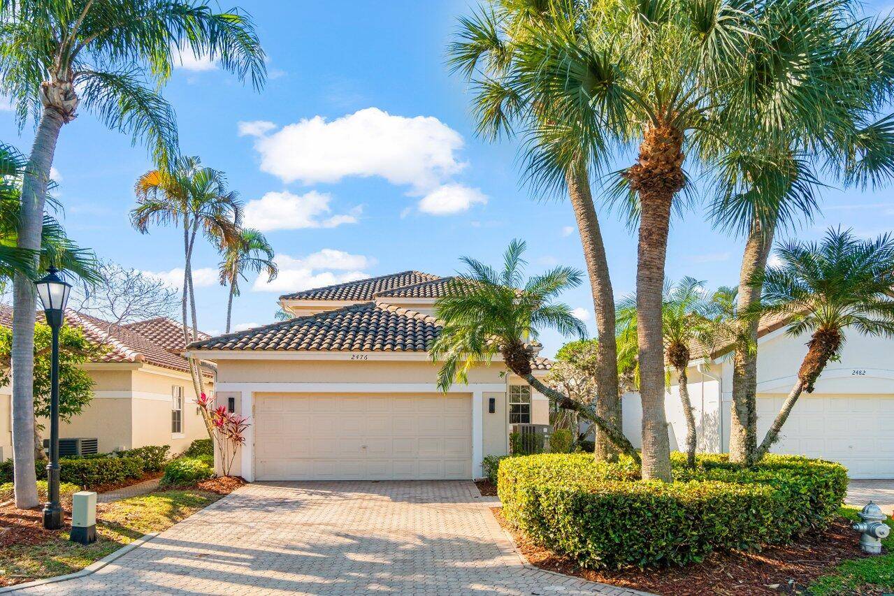 Welcome to your dream home in Boca Raton's prestigious Broken Sound Country Club.