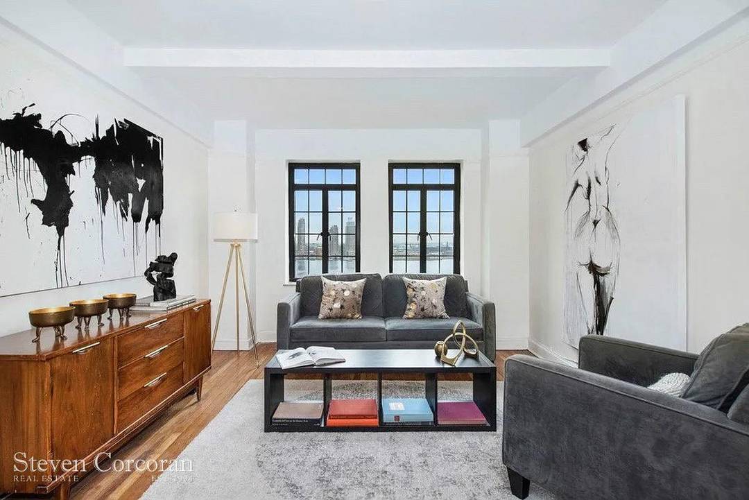Captivating East River Views from this bright top shelf One Bedroom apartment with several key upgrades.