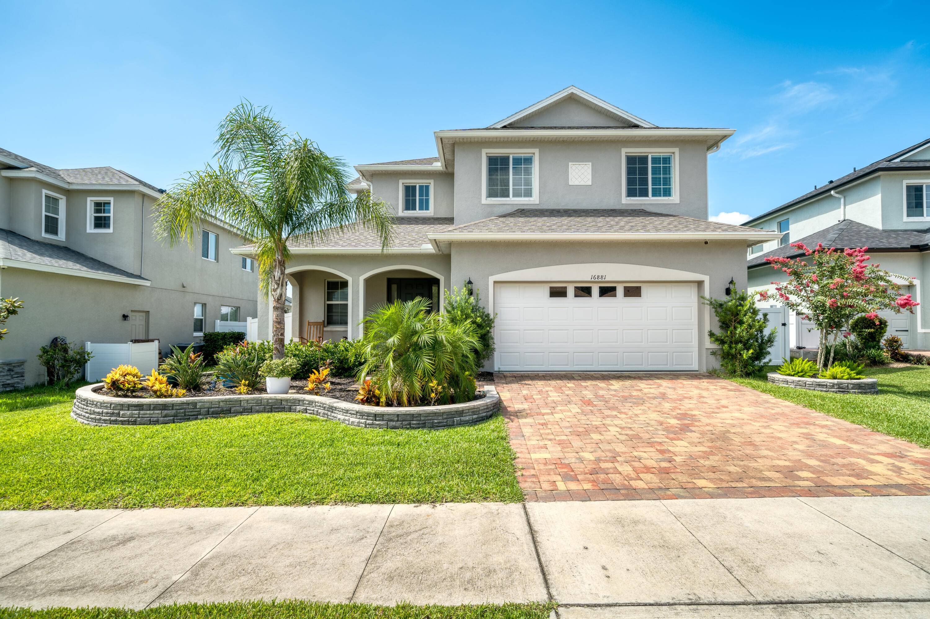 Experience resort style living at its finest in this stunning home located in the Greater Lakes community !
