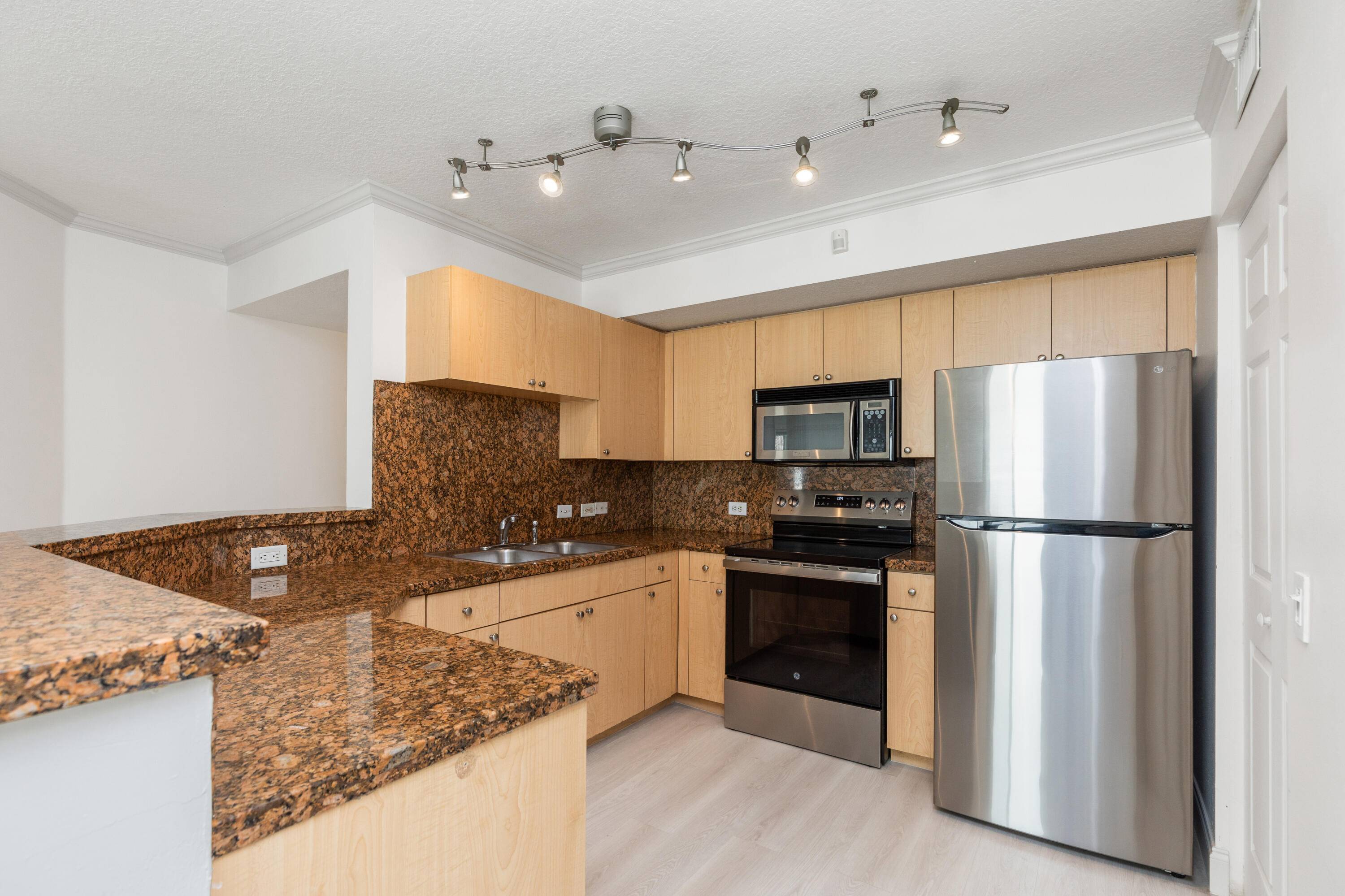 EXPERIENCE THE BEST OF BOYNTON BEACH LIVING IN THIS BEAUTIFUL THREE BEDROOM TWO BATH CONDO OFFERING A PARTIAL LAKE VIEW AND SPACIOUS LAYOUT.