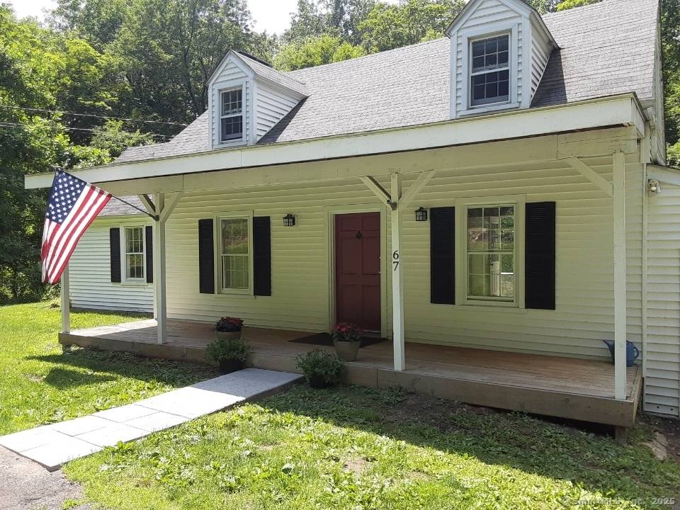 Cozy charm of a vintage three bedroom, two full bath home on nearly three acres !