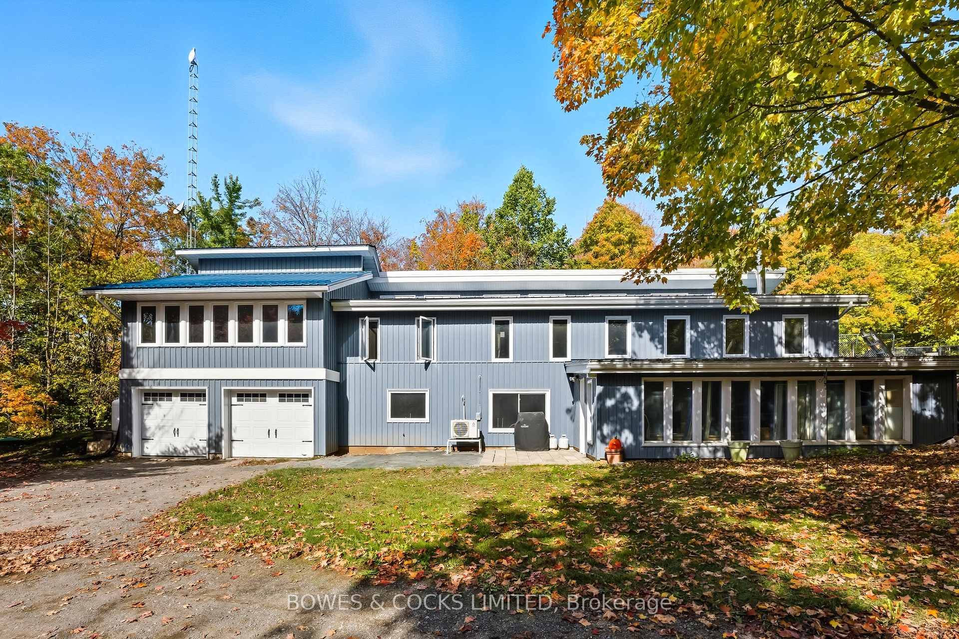 Follow the winding laneway to this passive solar home sitting in a clearing in this 45 acre forested property.