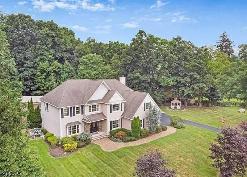 Fully furnished and tucked away on a quiet cul de sac in Oak Ridge, this beautiful colonial offers a lifestyle of comfort, privacy, and effortless living.