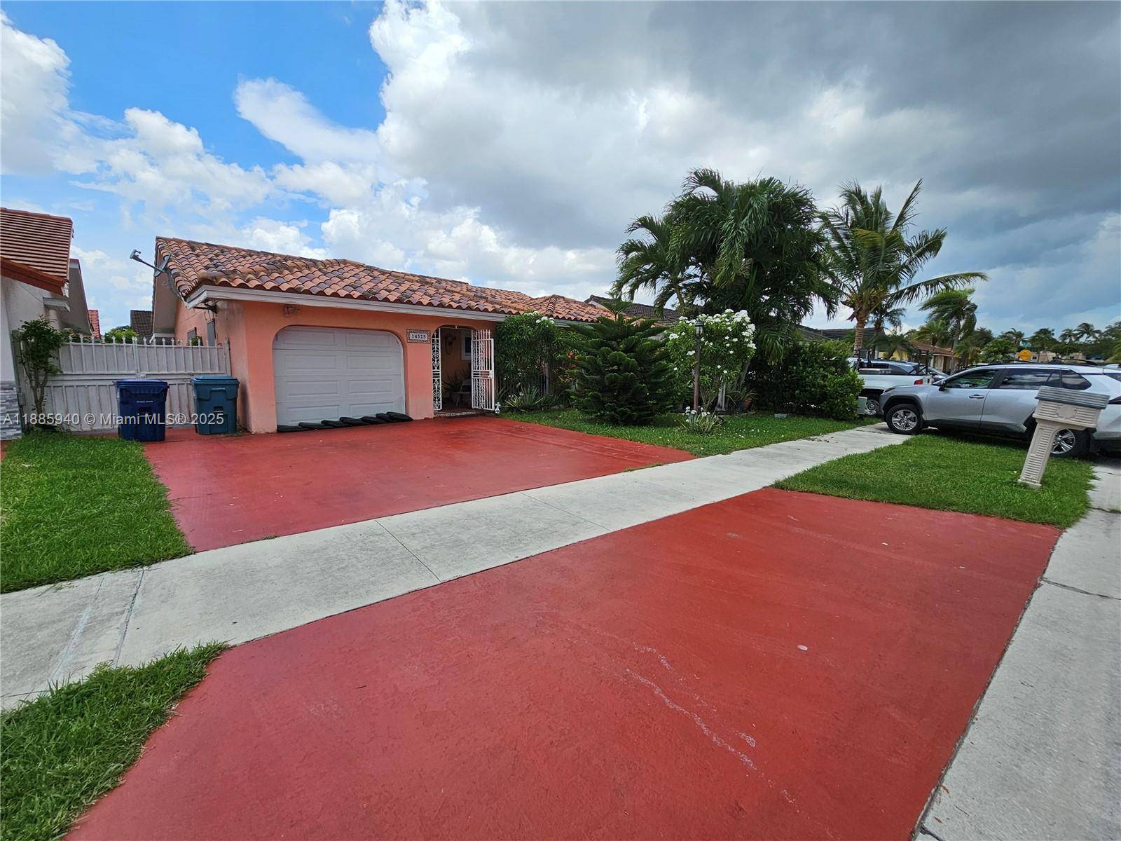 Spacious 5 bedroom, 3 bathroom home featuring a newly renovated modern kitchen with sleek countertops, perfect for family gatherings.