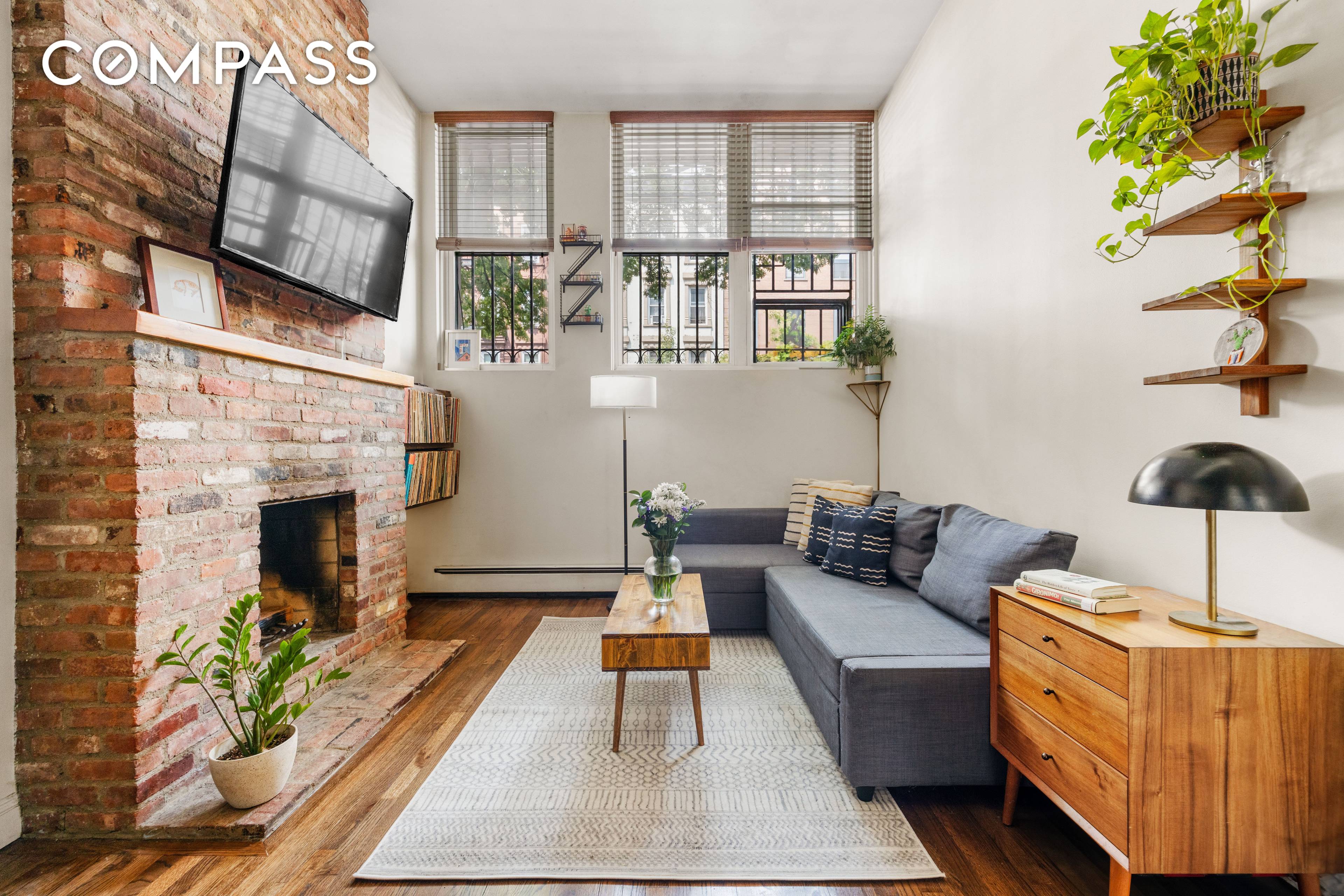 Welcome to this spacious 1 bedroom featuring high ceilings, a working wood burning fireplace, and a separate lofted space.