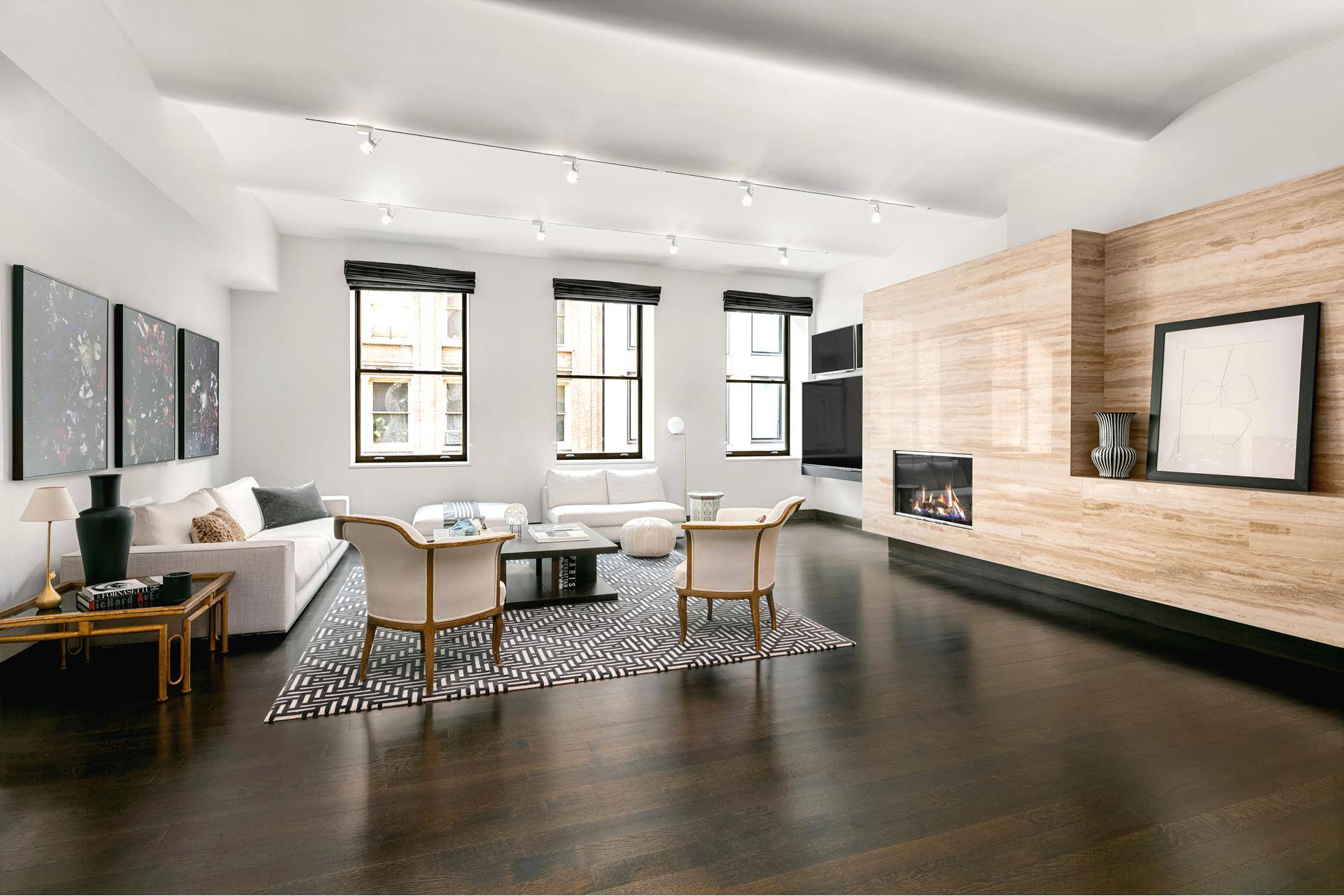 Stunning, sprawling Soho loft located within a boutique full service prewar condo building !