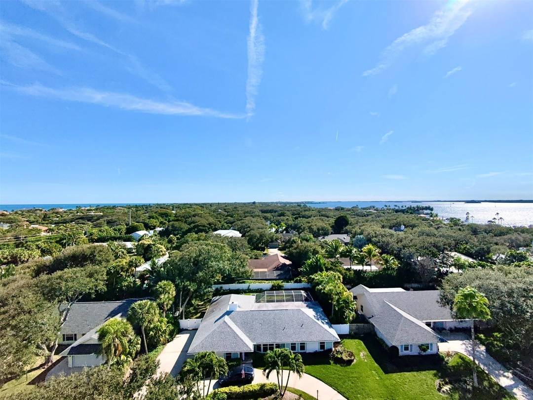Discover your dream home with exclusive Deeded Access to a Private Beach and Indian River here in Castaway Cove IV.