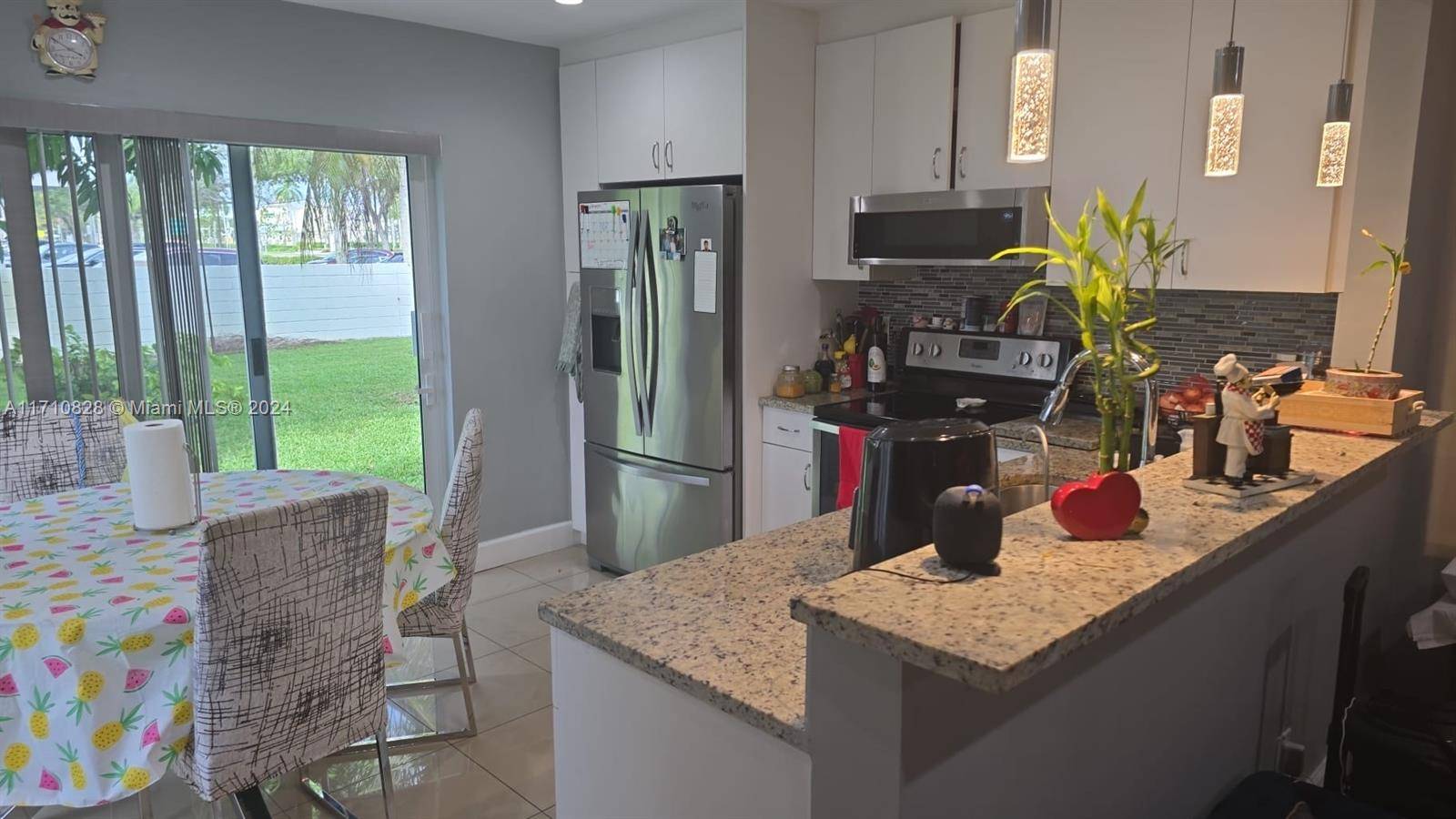 BEAUTIFUL 3 2 VILLA. NEWER ROOF, HURRICANE IMPACT WINDOWS, RENOVATED KITCHEN, BONUS ENTERTAINMENT ROOM, LOW HOA, GREAT LOCATION !