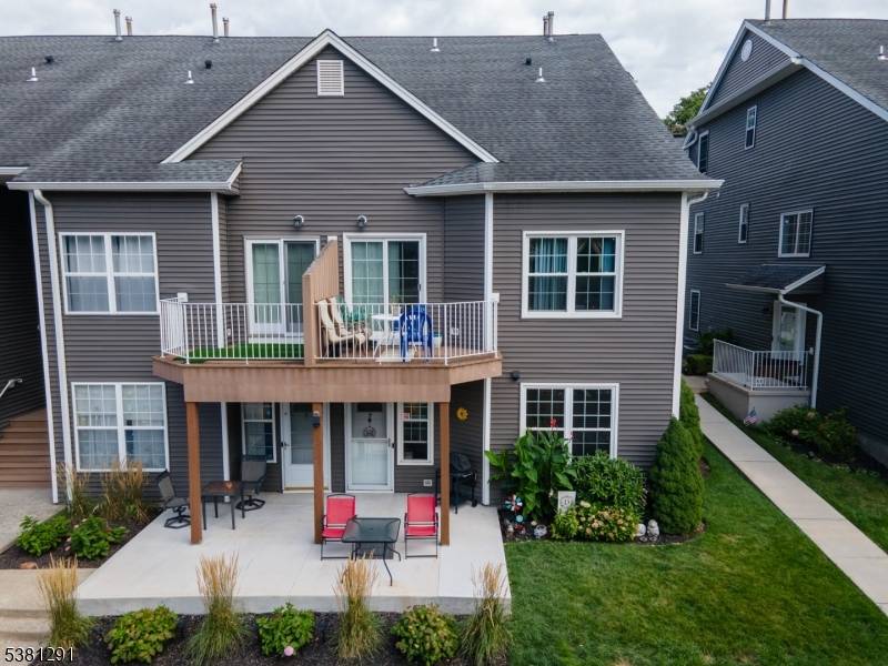 Beautifully updated move in ready and pet friendly 2 bedroom 1 and a half bathroom 2 story townhome end unit in desirable Arlington Ridge !