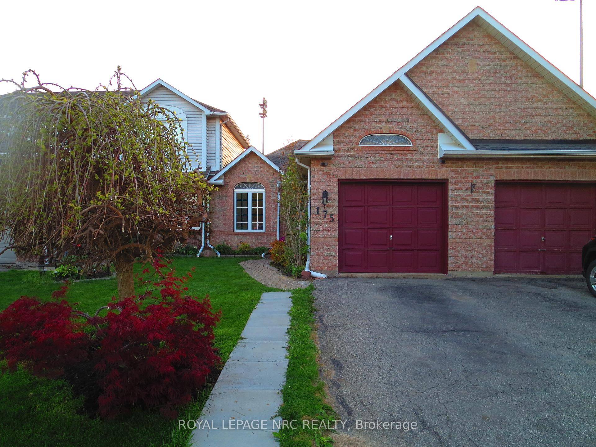 2 1 BEDROOM SIDE SPLIT TOWNHOUSE WITH SINGLE ATTACHED GARAGE BACKING ONTO THE WELLAND STADIUM.