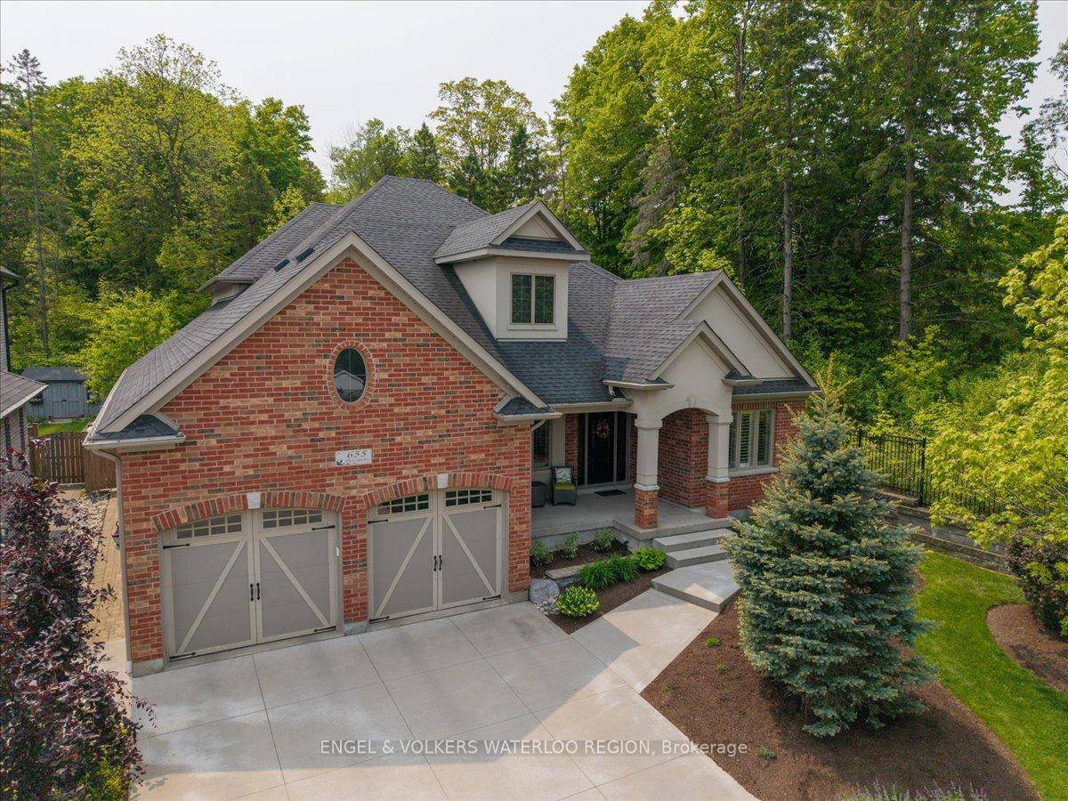 Welcome to this stunning custom built home, ideally located in one of the area's most sought after neighbourhoods, backing onto and beside green space.