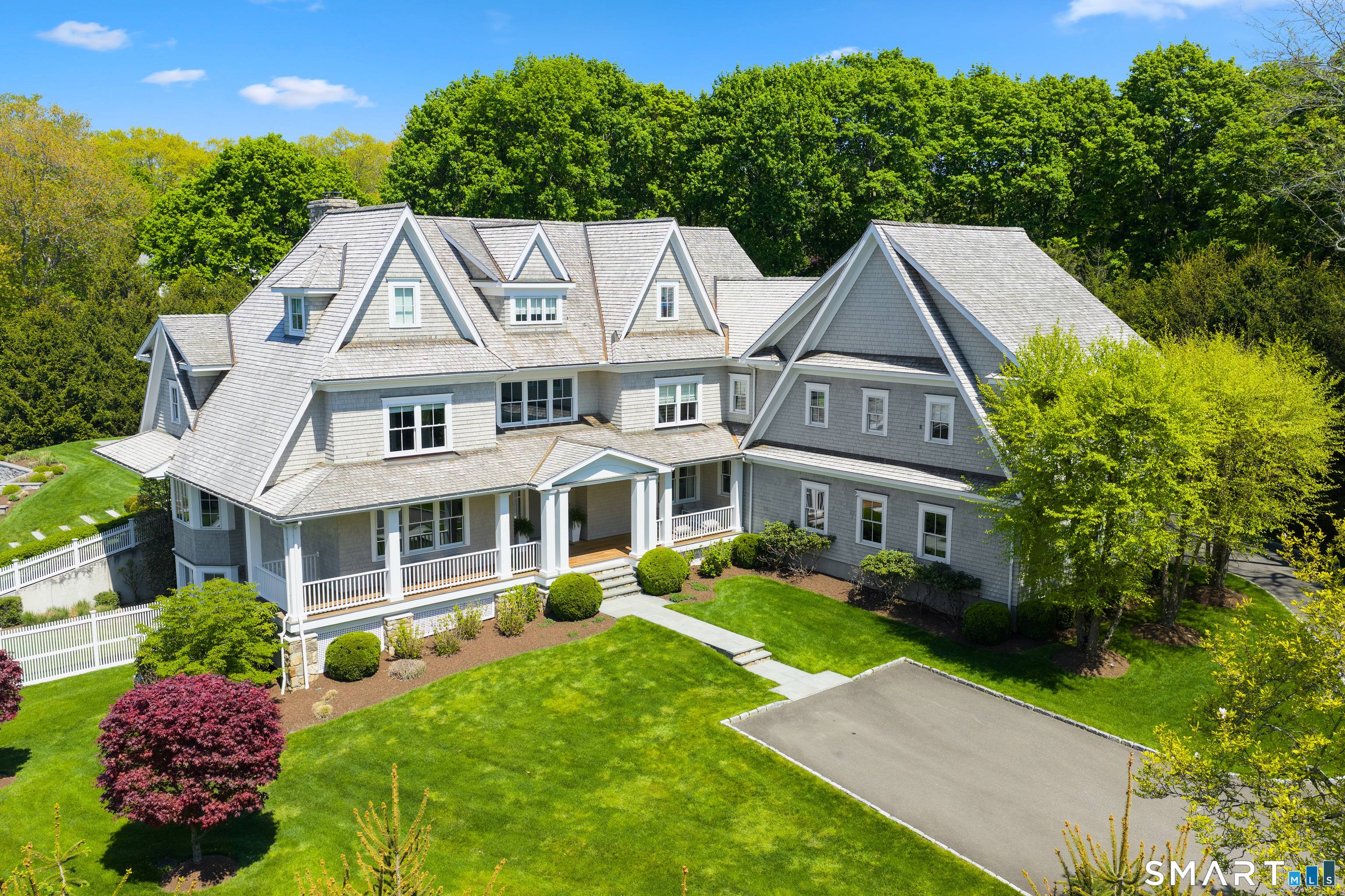 Nestled on a quiet cul de sac in one of Westport's most convenient locations, 6 Twin Circle Drive offers luxury living with exceptional indoor and outdoor spaces.