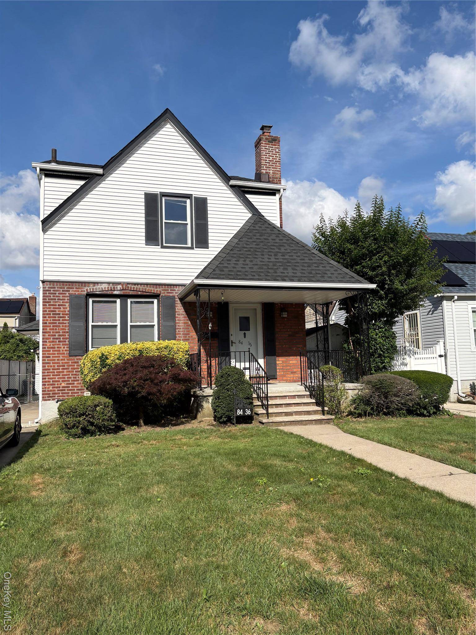 Immaculate Tudor Colonial in Prime Bellerose Location !