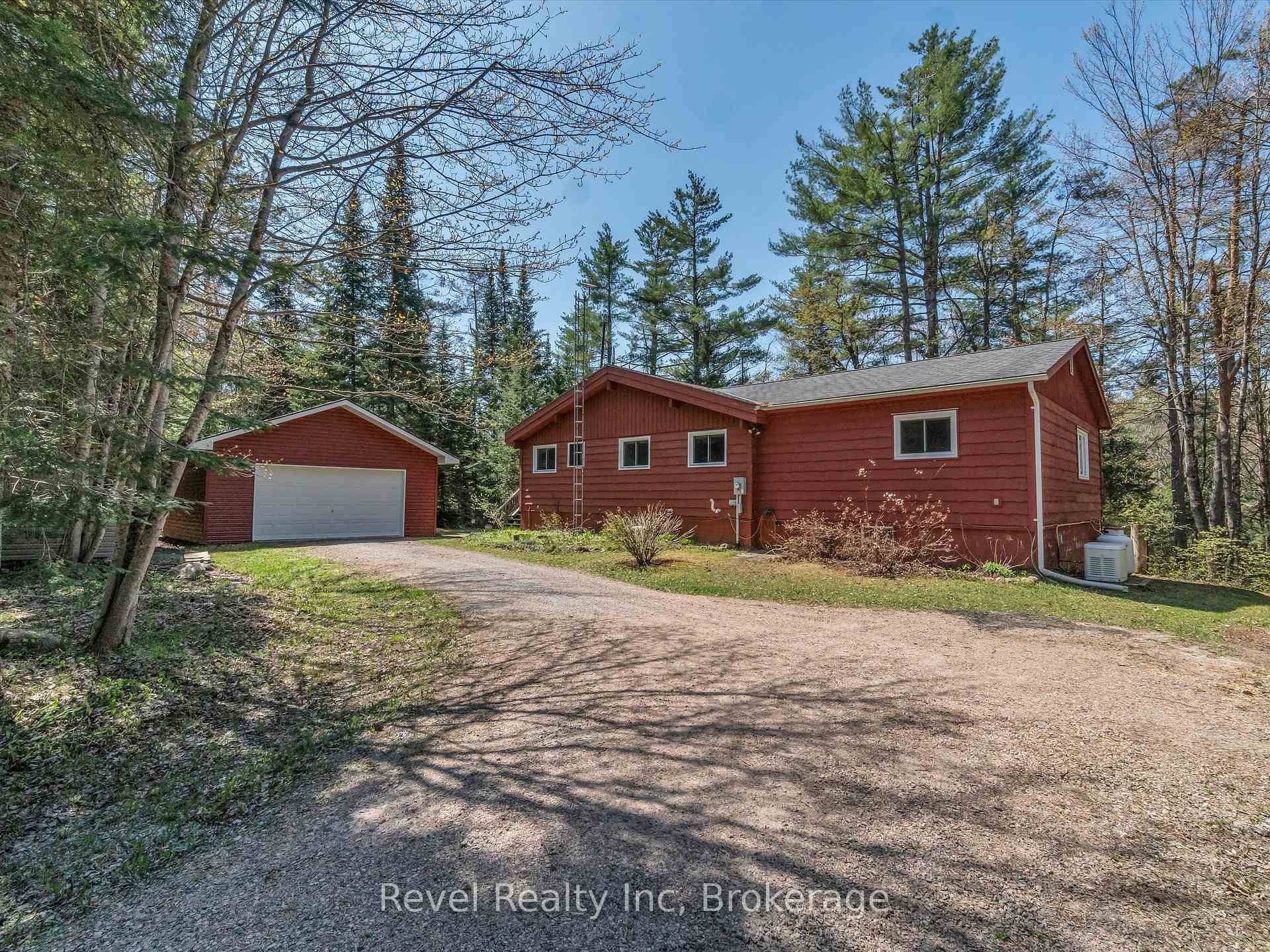 Welcome to your peaceful escape on the Black River, set on a beautifully wooded 3.