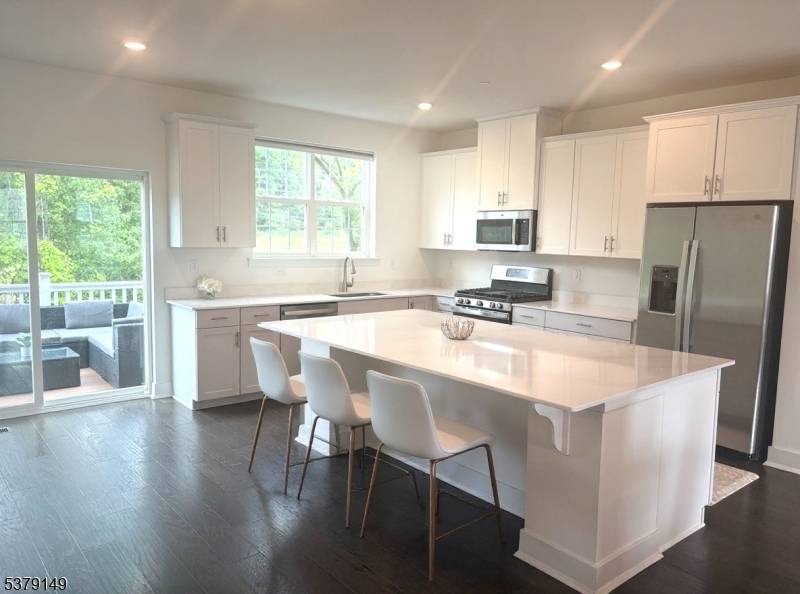 Nestled in the prestigious Collection of Morris Plains, this townhome offers over 2400 sq feet of sophisticated living space, designed for modern convenience and comfort.