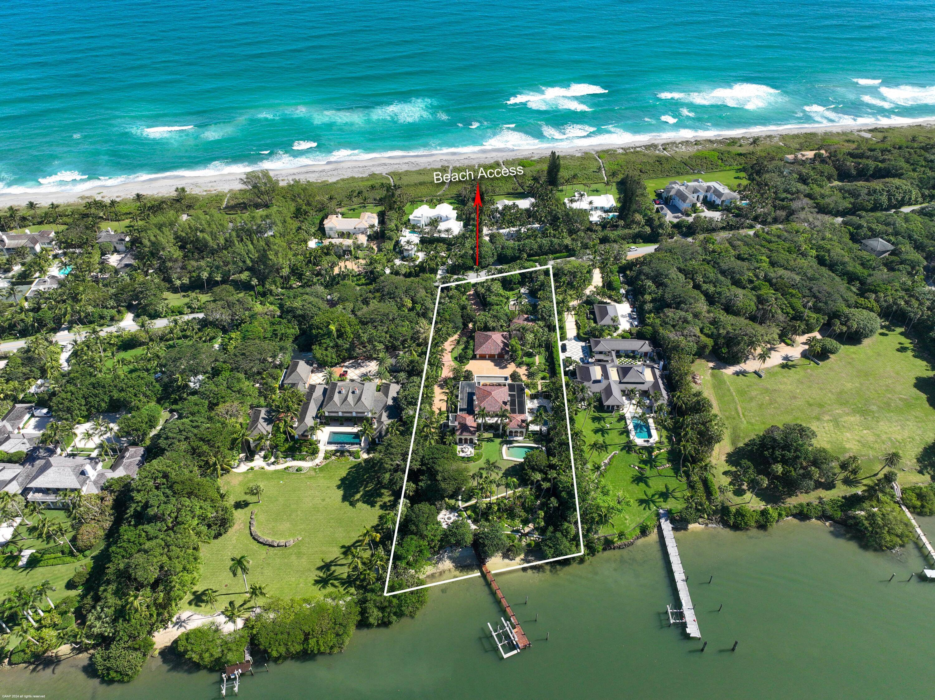 424 S Beach Rd with 172' of direct Jupiter Island Intracoastal frontage sits on almost 2 acres and represents the height of sophisticated, luxury waterfront living.