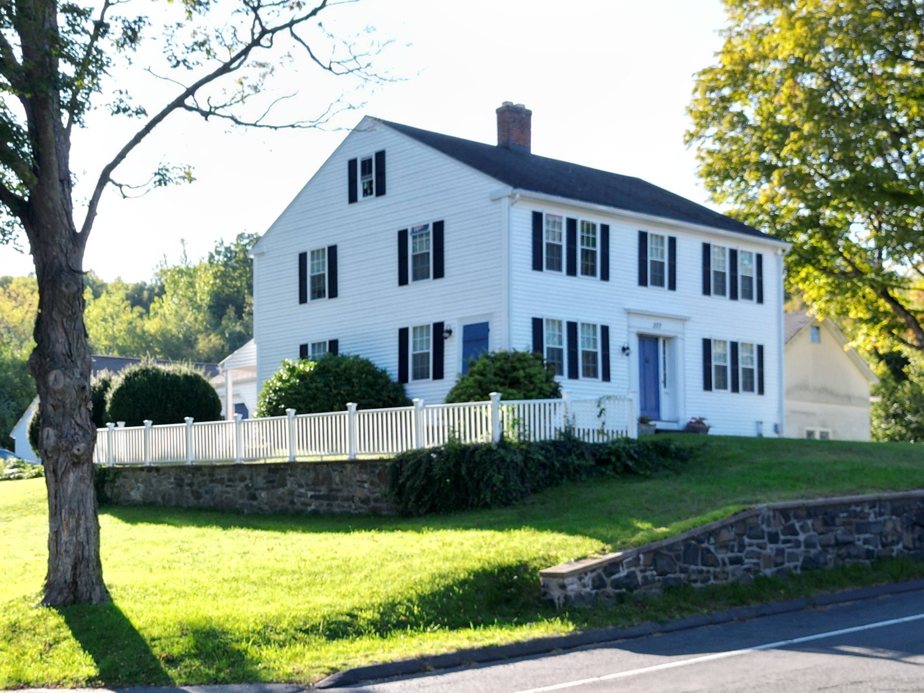 Charming colonial home featuring modern conveniences while maintaining its beautiful character.