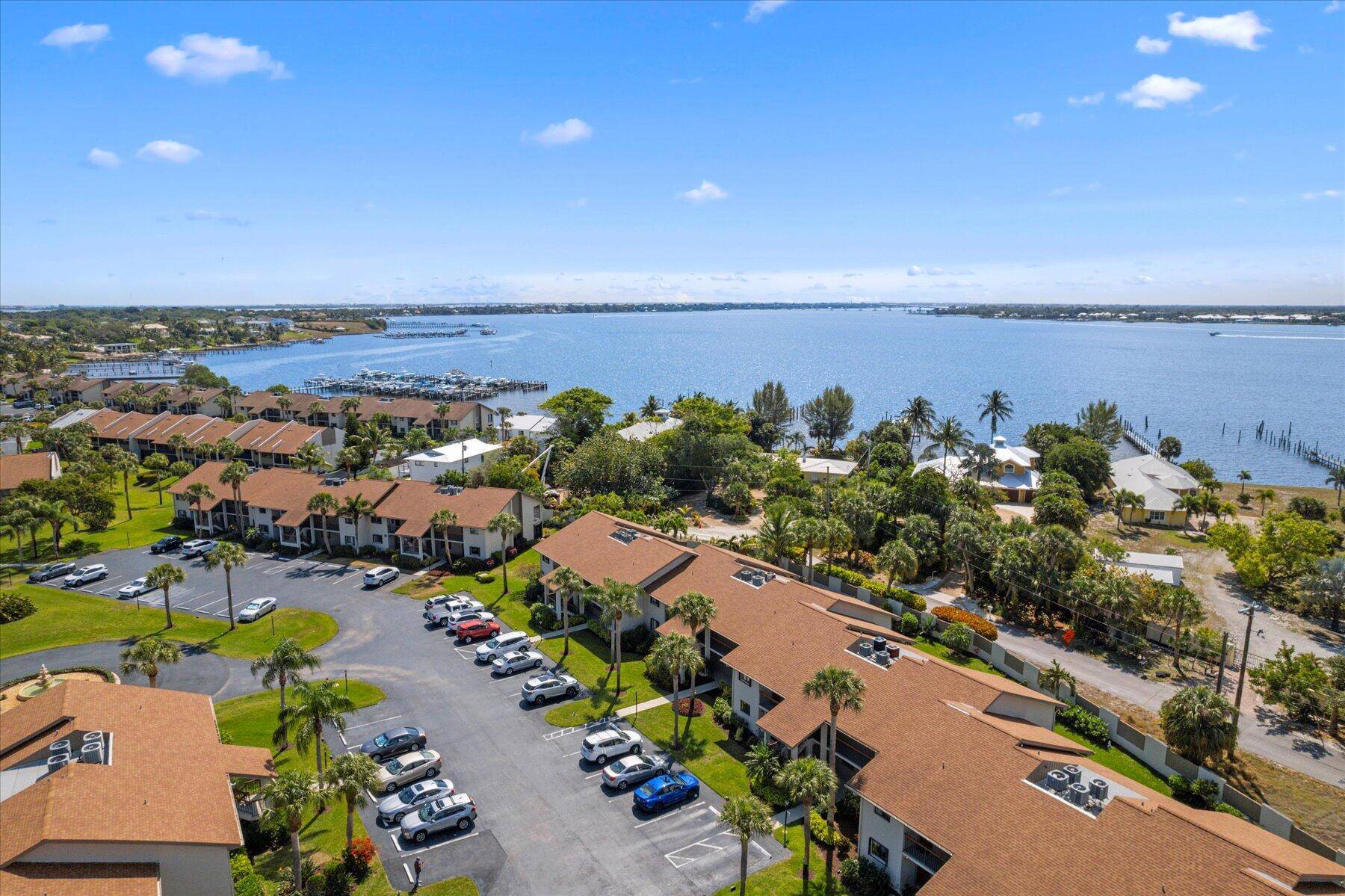 Discover this immaculate, light and bright, spacious 2 2 condo in the desirable River Club community, offering peek a boo views of the St.