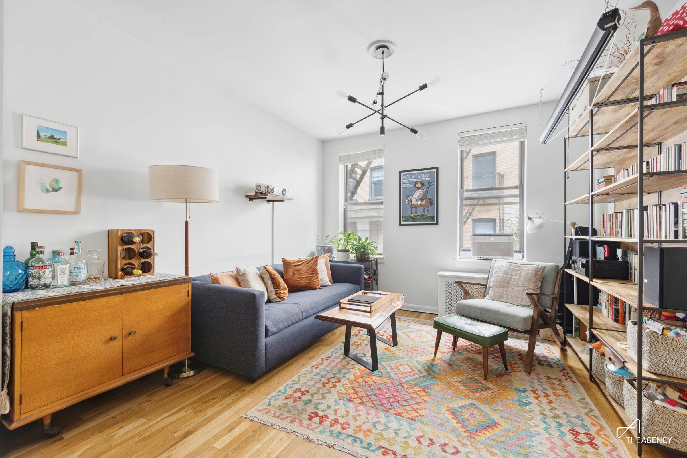 Located on one of the loveliest tree lined blocks in Prospect Heights, this second floor two bedroom condo greets you with a charming gallery hall.