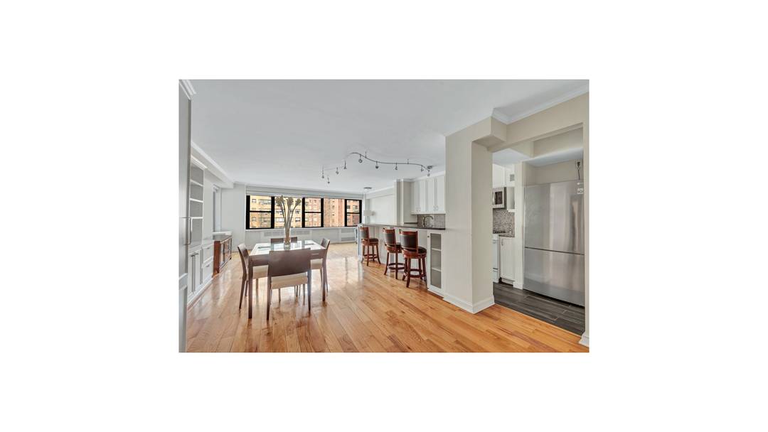 Exceptional opportunity to own a spacious and flexible one bedroom, two bath home at Sutton Gardens.