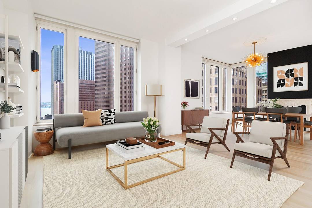 UNIQUE FLEX LAYOUT TRIPLE EXPOSURE WATER VIEWSWelcome home to an exceptional and highly versatile condominium opportunity at 15 William Street.