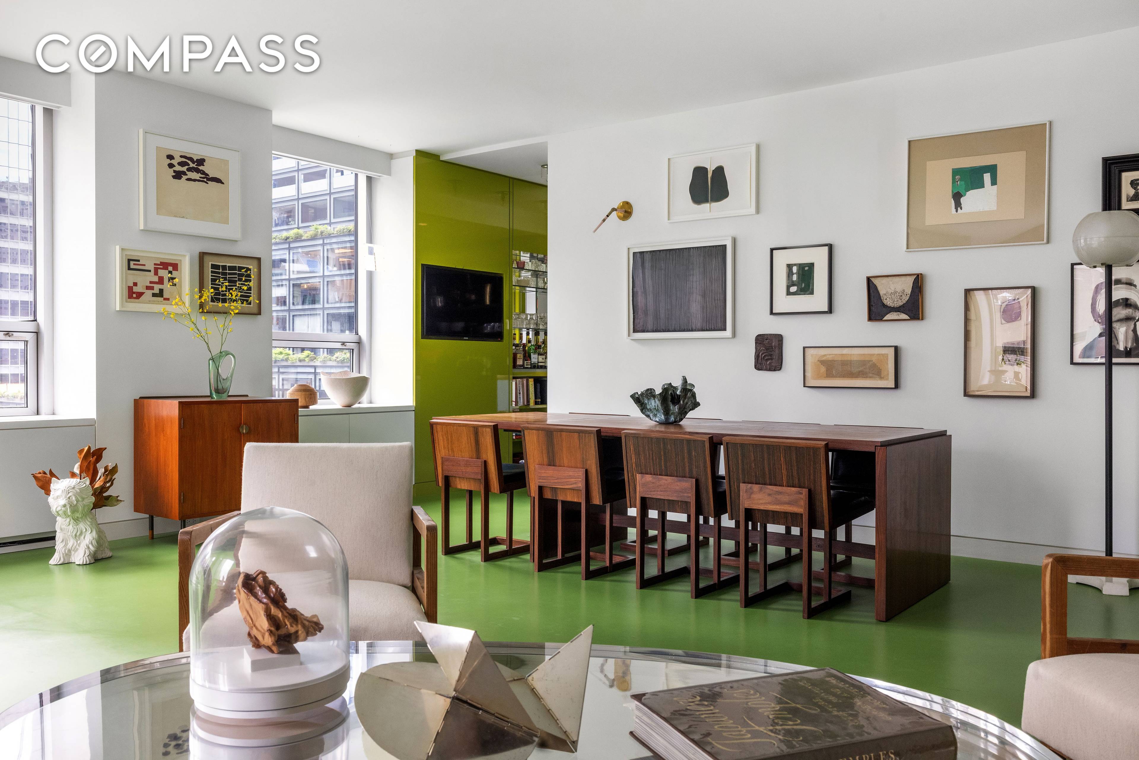 Impeccably designed as a luxurious aerie overlooking the gardens of the Museum of Modern Art, this turn key 1 bedroom, 1.