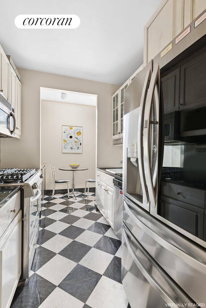 Spacious and unique three bedroom three bathroom corner unit in one of the most desirable condo buildings in Midtown East !