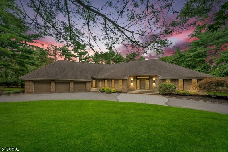 Welcome to 301 Hopper, an expansive 5 bedroom, 5 bath contemporary, multi level residence on a tranquil cul de sac in prestigious Franklin Lakes.