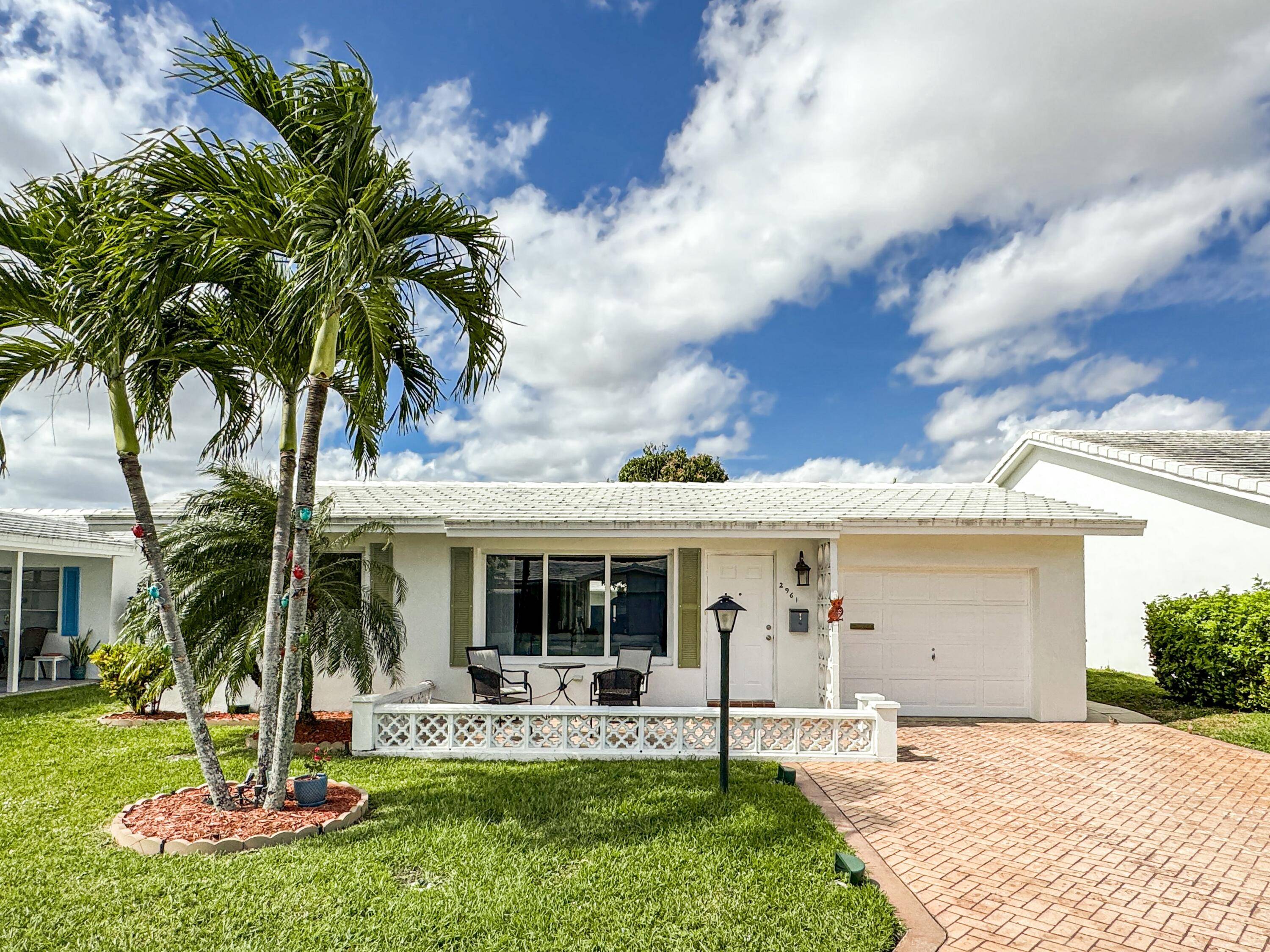 Welcome to this charming and inviting 2 bedrooms, 1 bathroom home in the sought after Leisureville community of Pompano Beach offers a comfortable and spacious layout.