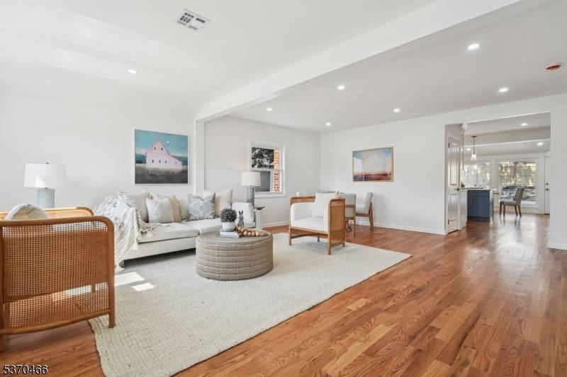 This completely renovated Cape Cod is the epitome of bright and modern !