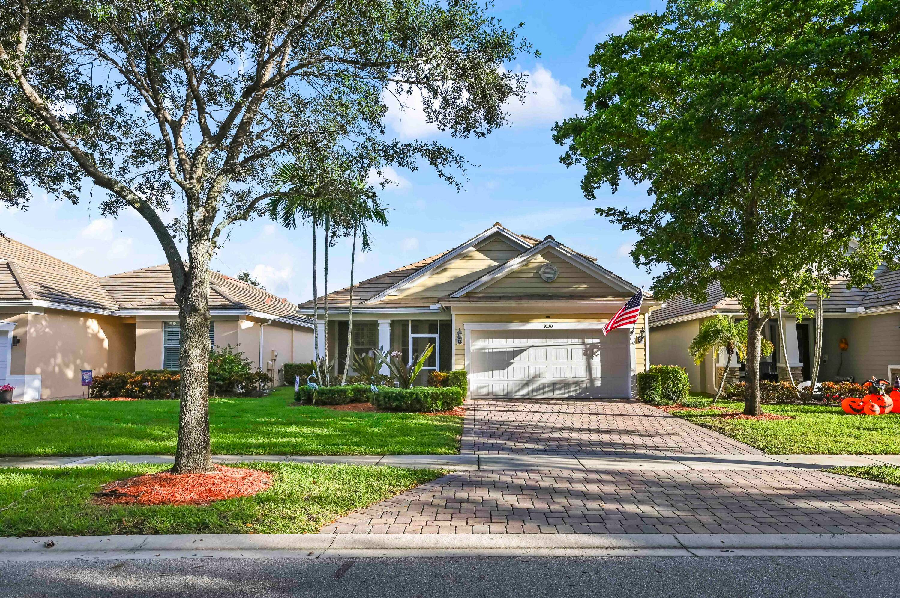 Welcome to this stunning home, perfectly situated on a serene waterfront lot within the beautifully maintained gated community, Oak Haven.