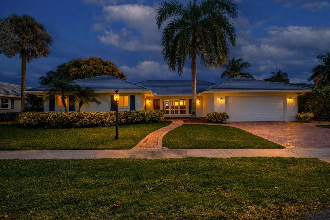 Renovated Camino Gardens Waterfront Residence in East Boca Raton's sought after enclave.