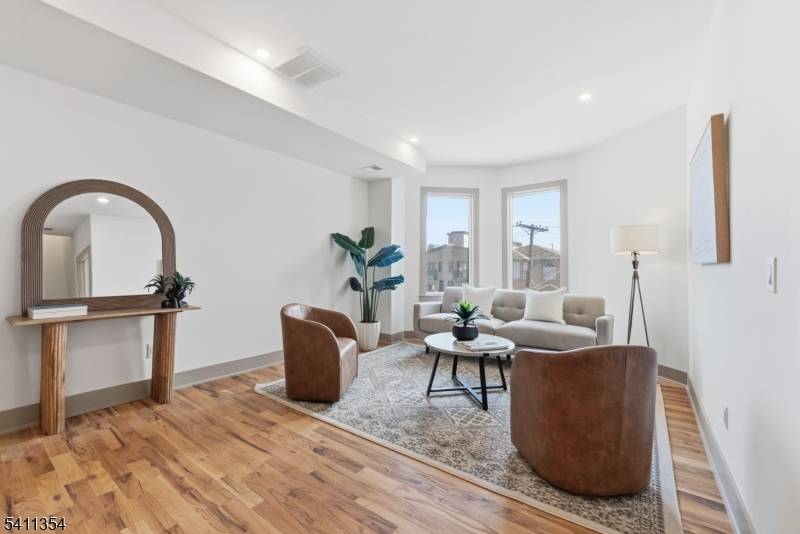 Welcome to this truly exceptional, custom built two family residence, with both units offering approximately 2, 000 sq ft duplex 2 floor layouts.