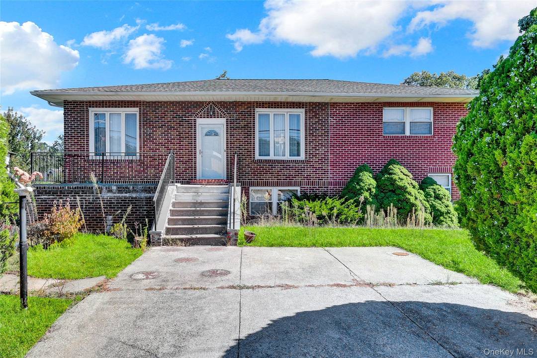 A rare opportunity awaits in the prestigious Half Hollow Hills East School District with Full BRICK house and 0.