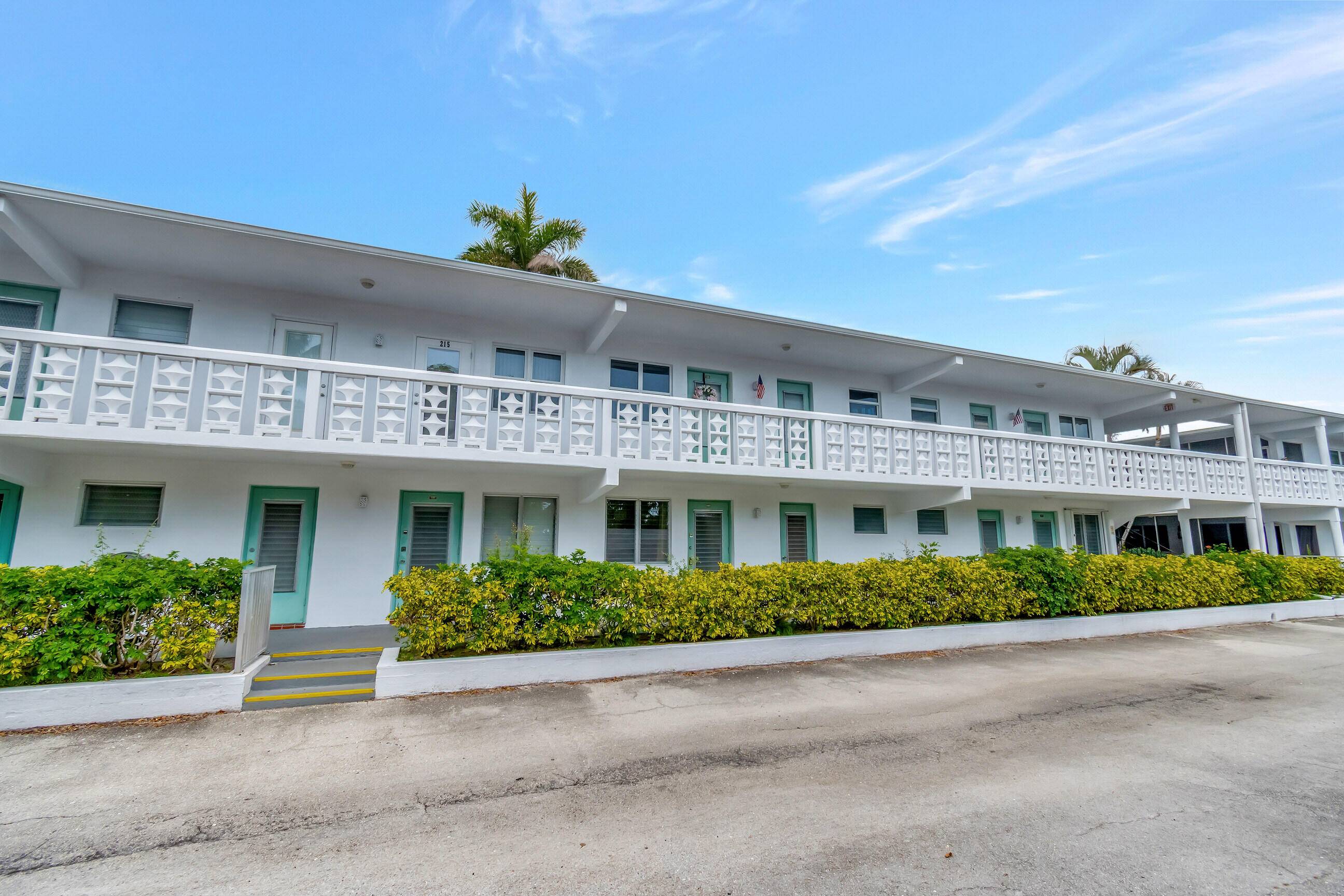 Charming community in Lighthouse Point featuring beautiful landscaping with an Old Florida feel.