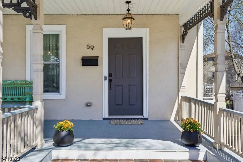 Step onto the charming front porch of this delightful home, filled with natural sunlight and radiating warmth.