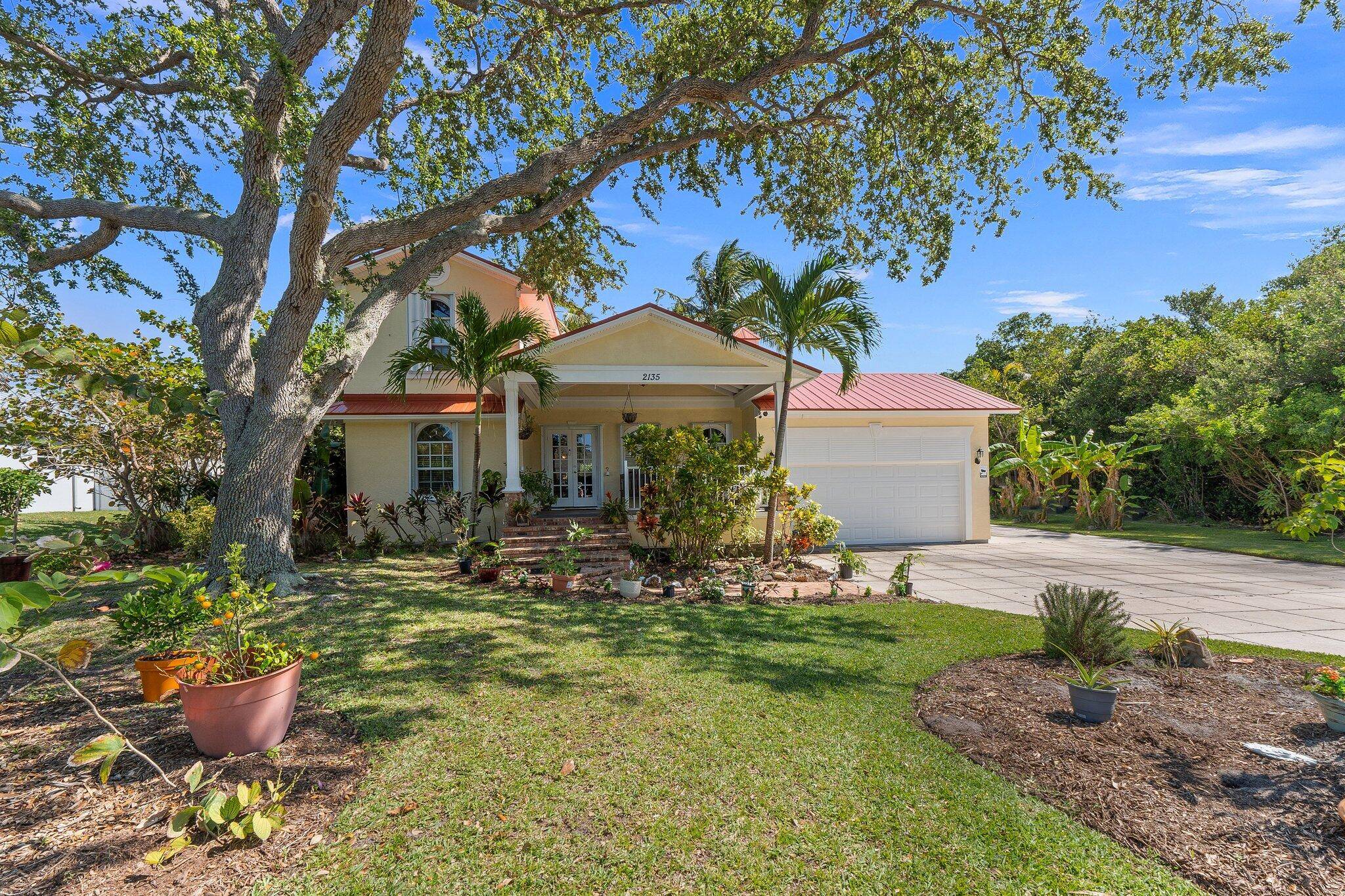 Extraordinary opportunity to own this breathtaking 1 3 acre property on the barrier island, nestled in an exclusive gated community where homes are valued at over 1 million !