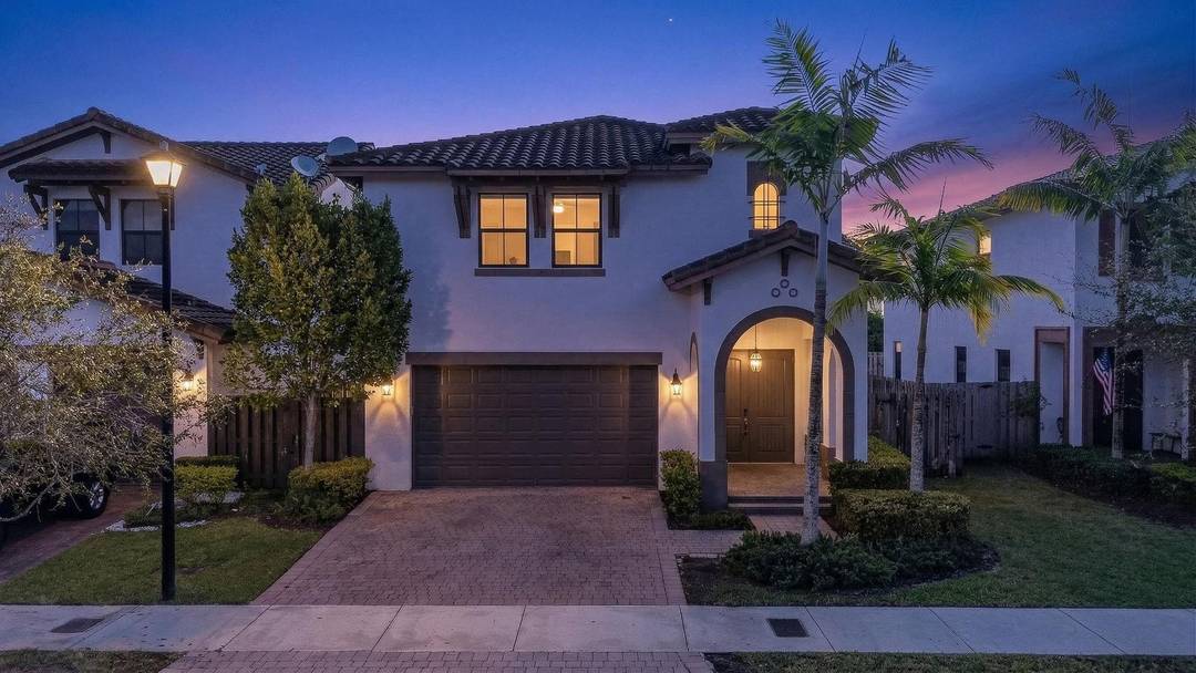 Indulge in modern grandeur in MADISON AT CENTRAL PARK, a 2015 masterpiece in the elite gated Isles at Grand Bay.