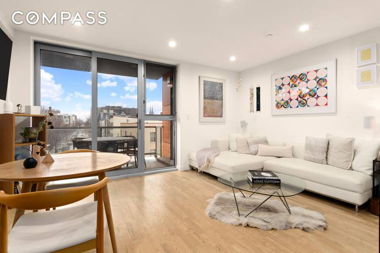 Floor to ceiling windows, a private balcony, and an open concept layout sets the tone for Unit 4 at 261 Union Avenue a two bedroom, two bathroom condominium offering 885 ...