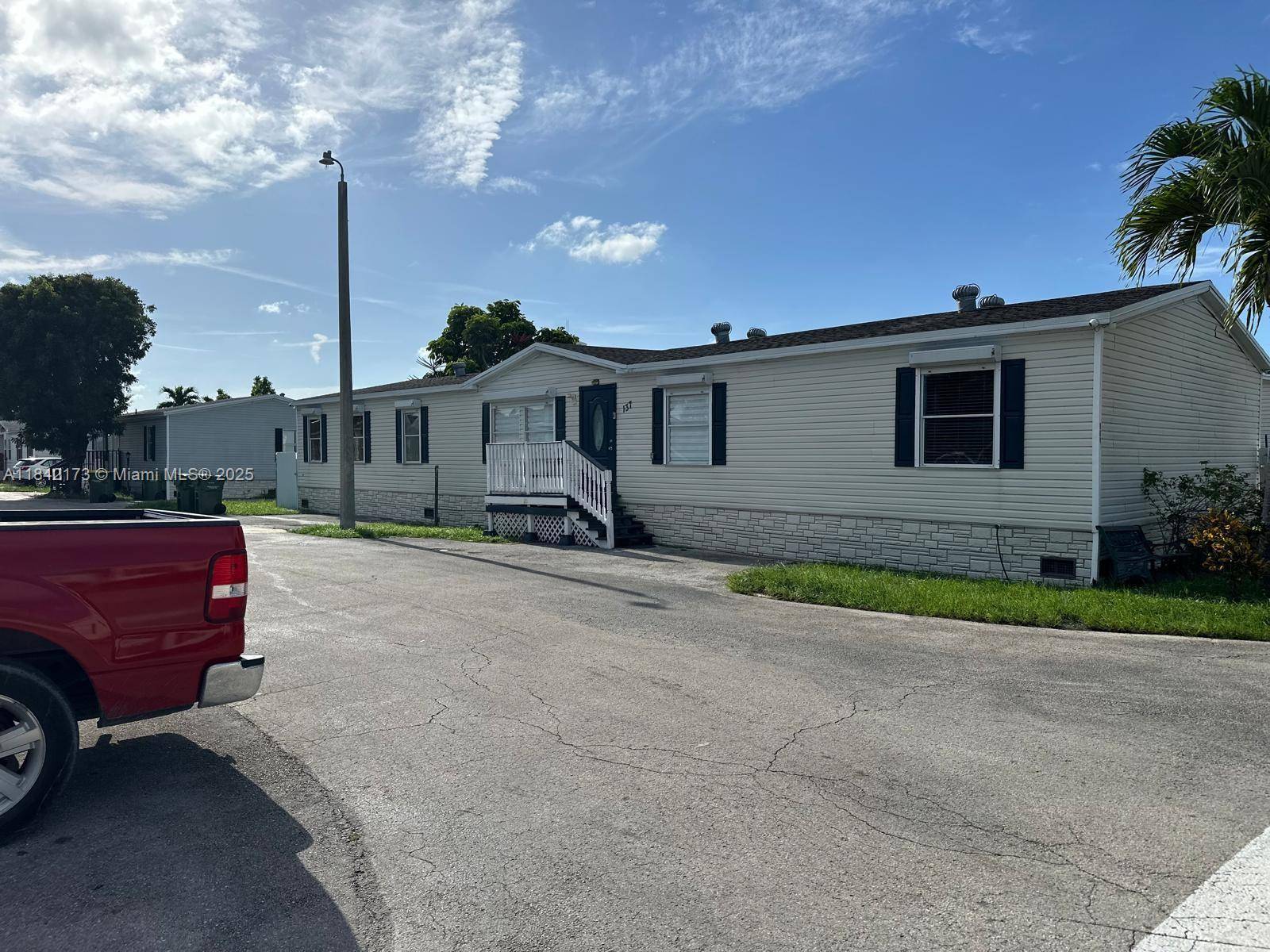Welcome to this updated and spacious 2004 manufactured home with 4 bedrooms and 2 bathrooms, situated on a corner lot and fully fenced, measuring 5, 020 sq.