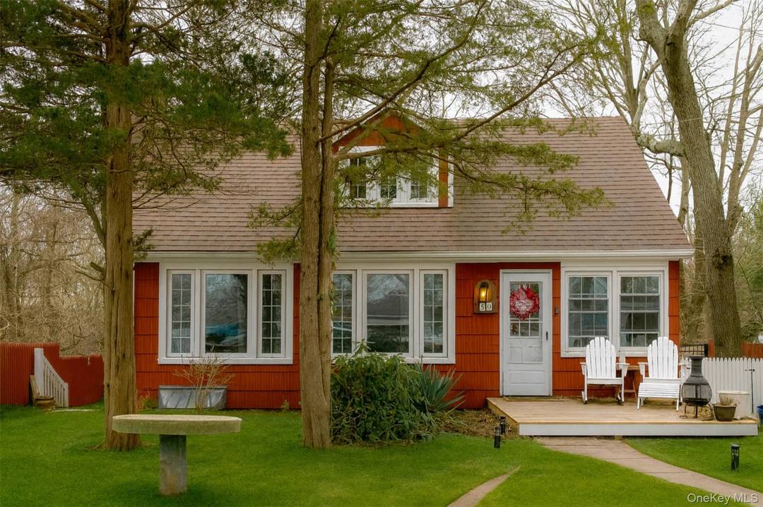 Set in the heart of coastal Rocky Point, this charming 2 bedroom, 2 bath Cape Cod offers timeless character paired with thoughtful flexibility.
