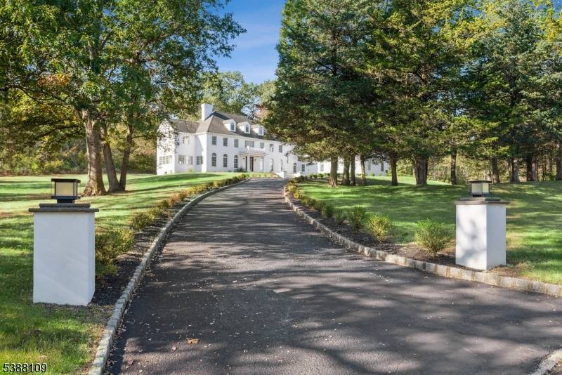 Nestled on a private 5 acre cul de sac estate, this newly updated residence offers 6 spacious bedrooms and 7 full 2 half beautifully appointed bathrooms.