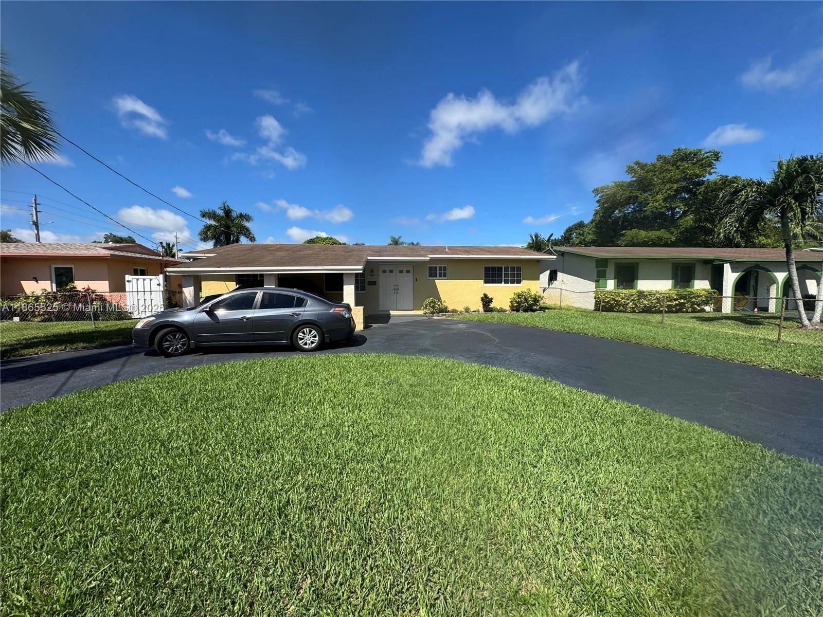 4 BR 2BA Available in The City of Sunrise, Updated Flooring, Kitchen, and both Bathrooms.