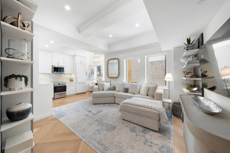 Welcome to Residence 1817 at the iconic JW Marriott Essex House, a beautifully reimagined one bedroom, two bathroom home offering an elegant blend of classic charm and modern luxury.