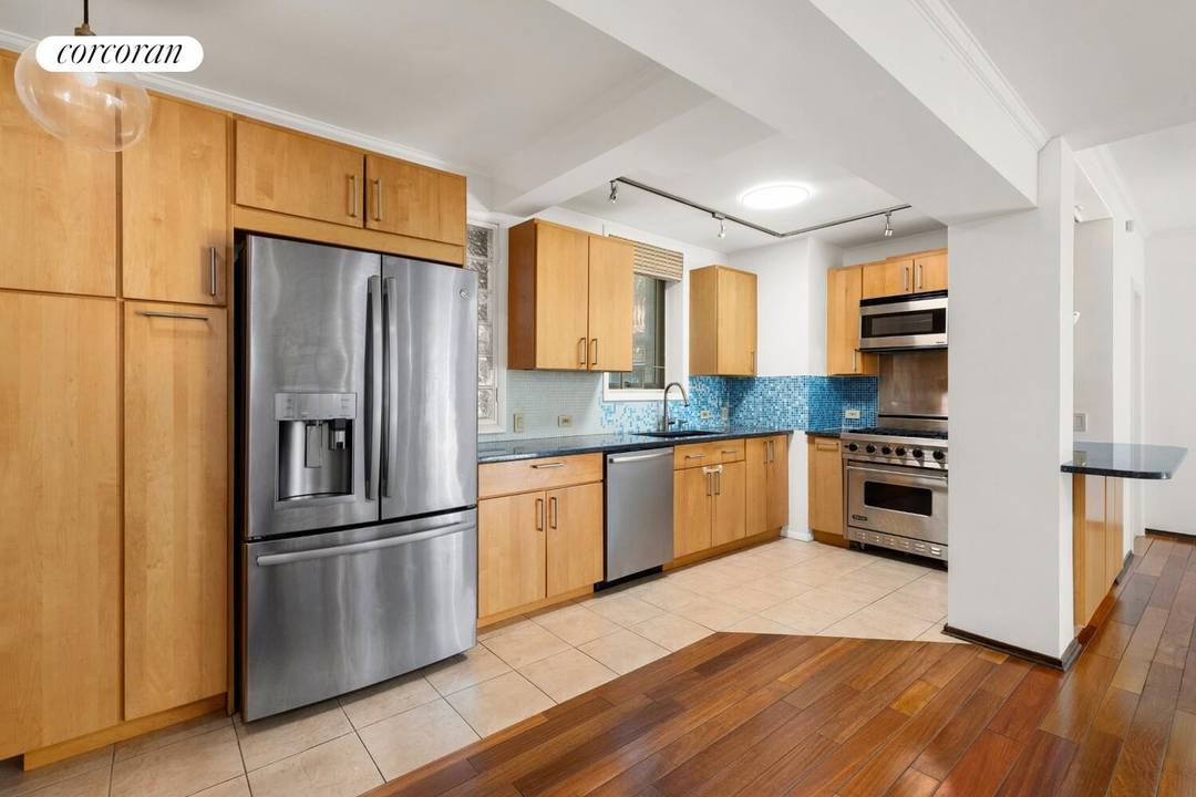 Dream Duplex home with an exceptional outdoor garden patio, nestled in the vibrant heart of Chelsea at 210 West 19th Street !