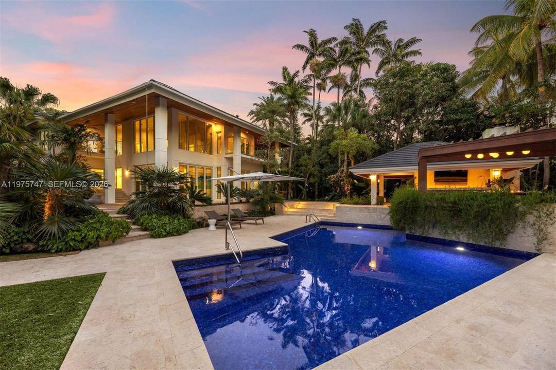 Secluded on a prime corner lot offering ultimate privacy in gated Cocoplum, this newly renovated just under 7, 674 sq ft home showcases lush landscaping by renowned architect Raymond Jungles ...