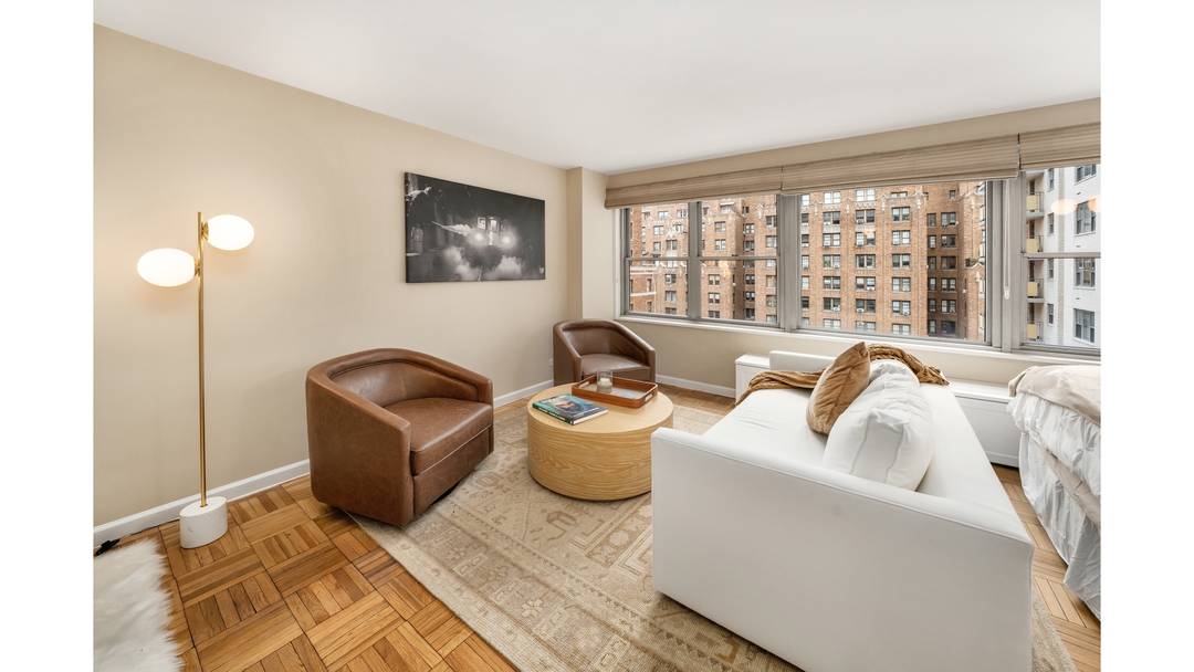 OCCUPANCY JULY 2026 Wonderful high floor alcove studio in the Mayfair Towers a fully serviced co operative right down the block from Central Park.